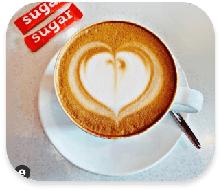 Coffee with late art of a heart
