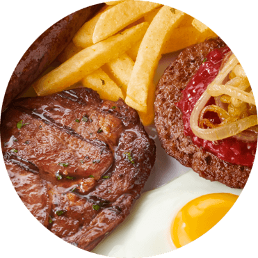 Burger patty, steak, egg and chips