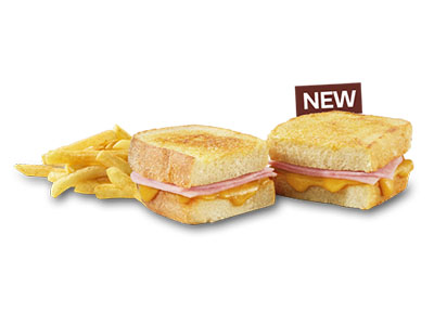 Ham and cheese toasted sandwich with chips