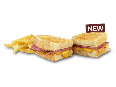 Beef Pastrami and cheese toasted sandwich with chips