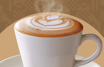 A cup of coffee with steam coming off it