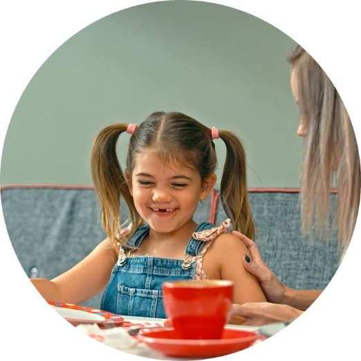 A little girl and her mom enjoy kids activities
