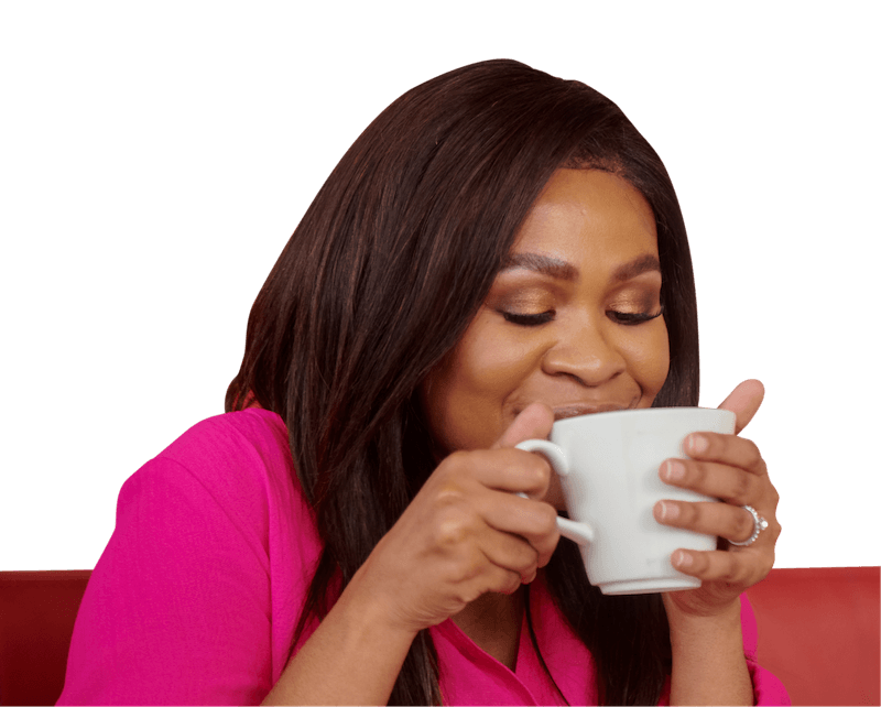 A woman enjoying a cup of coffee