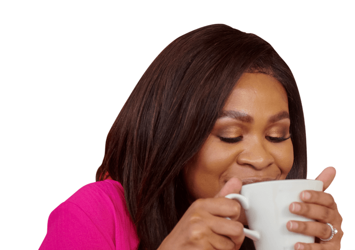 a woman enjoying a cup of coffee