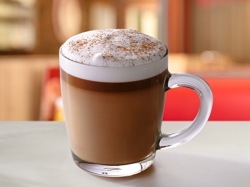 Caffe latte in a clear mug
