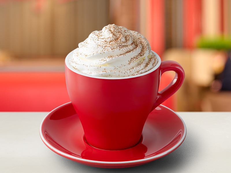 Cremoccino coffee in a red cup